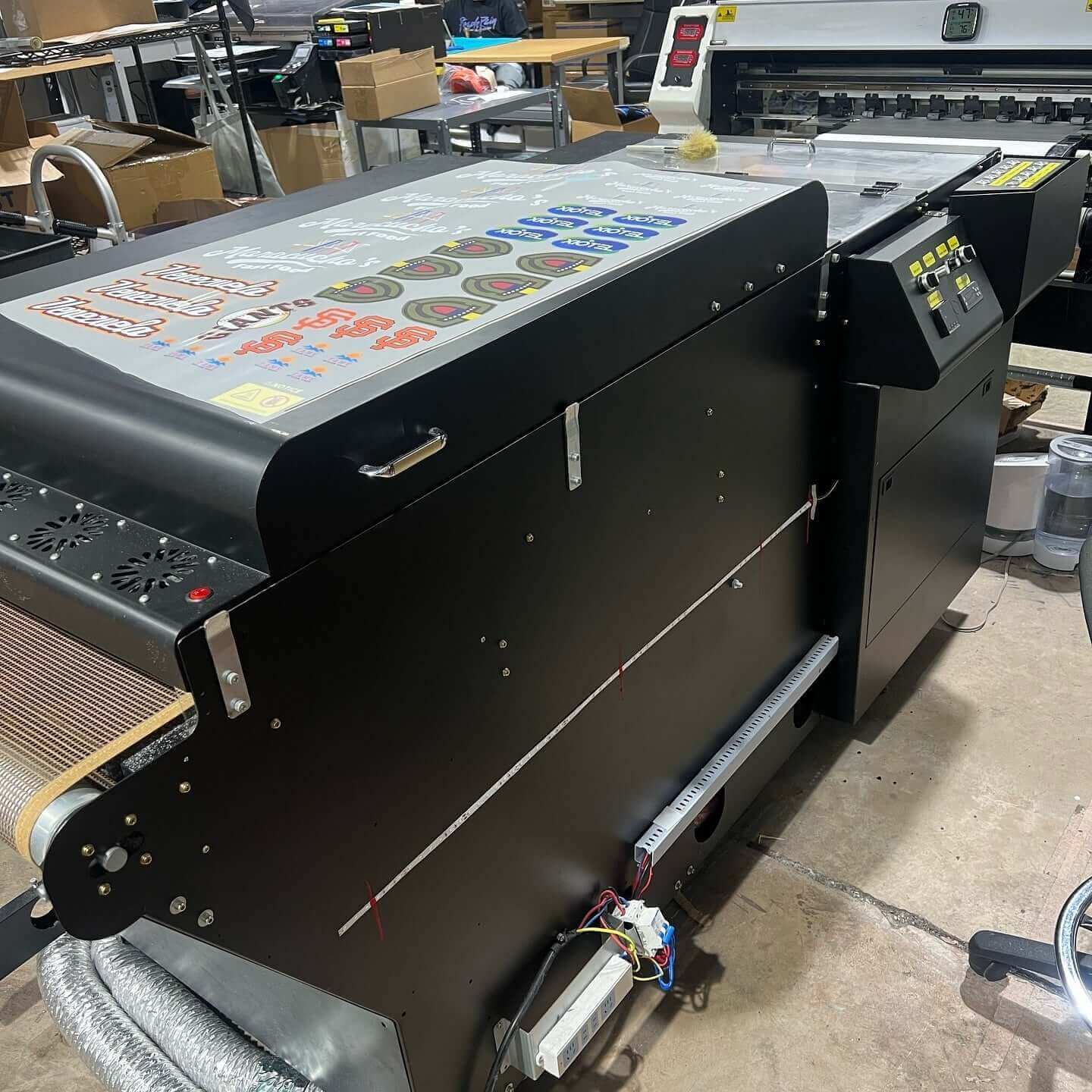 High-quality DTF printing machine with control panel for custom DTF transfers and gang sheet printing.